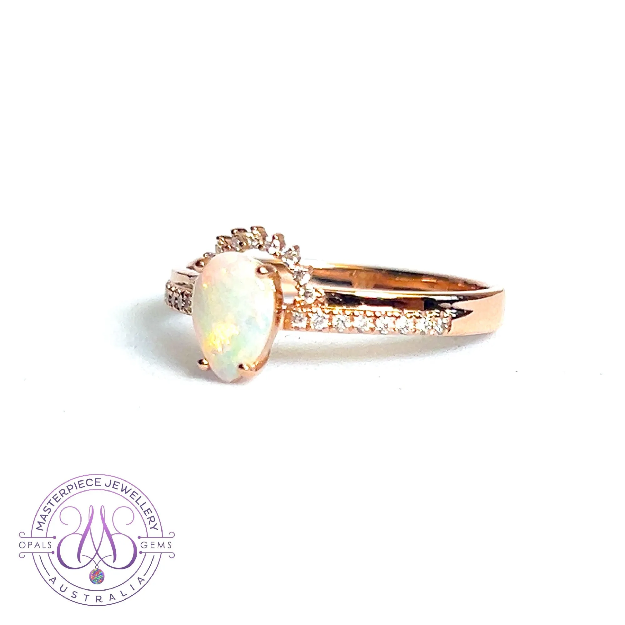 14kt Rose Gold pear shape Opal and diamond ring