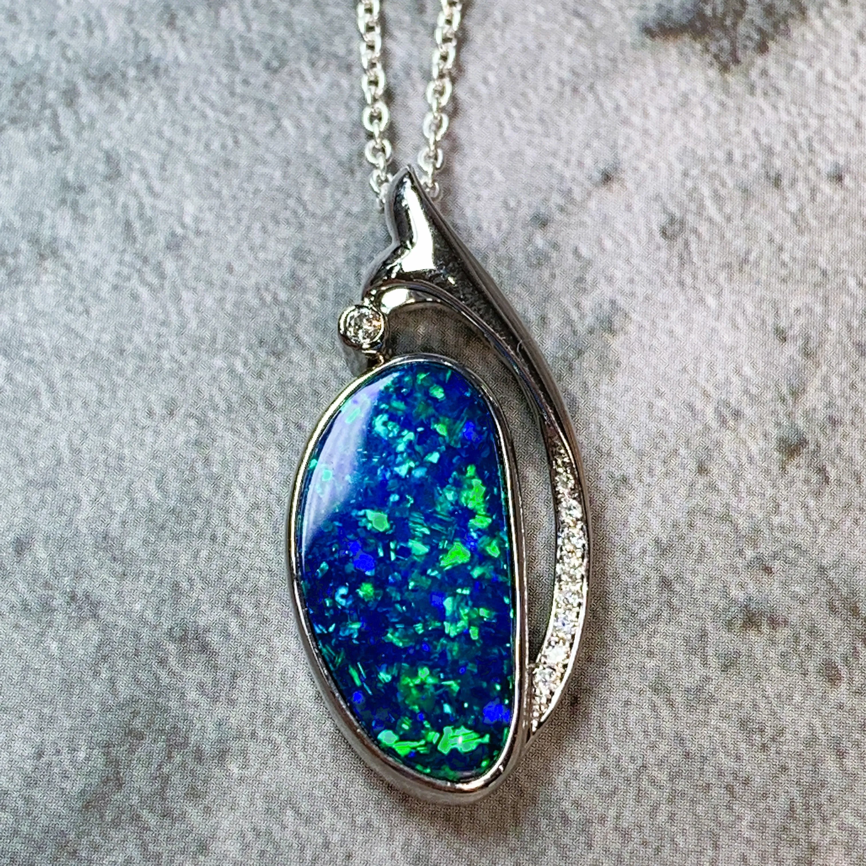 14kt White Gold 4ct Opal and Diamond pendant