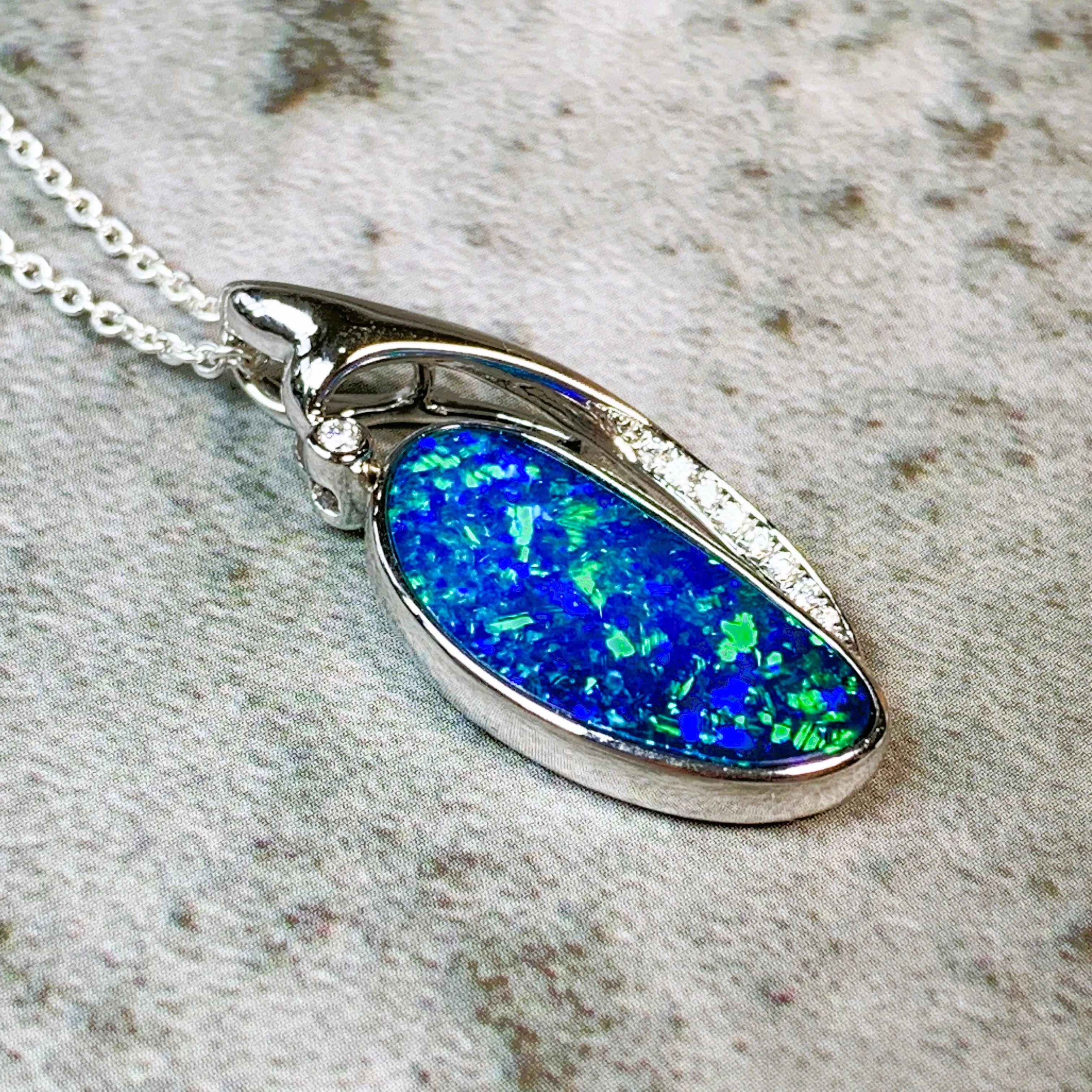 14kt White Gold 4ct Opal and Diamond pendant