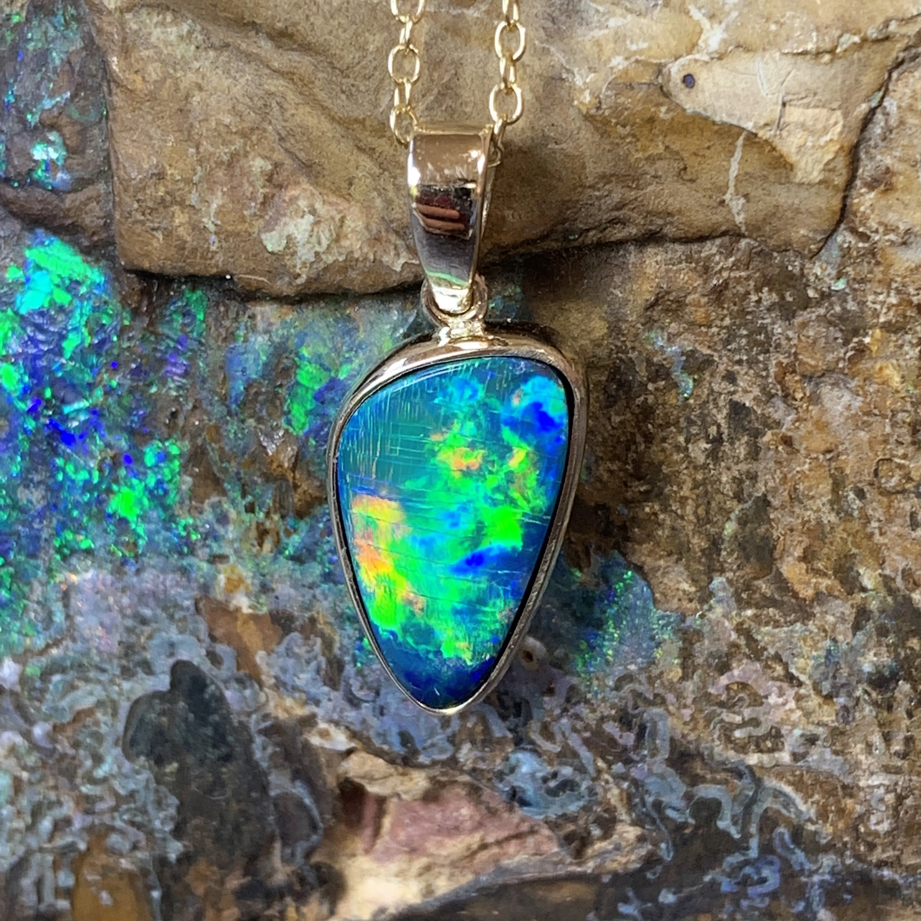 14kt Yellow Gold Black Opal 2.31ct bezel set doublet pendant