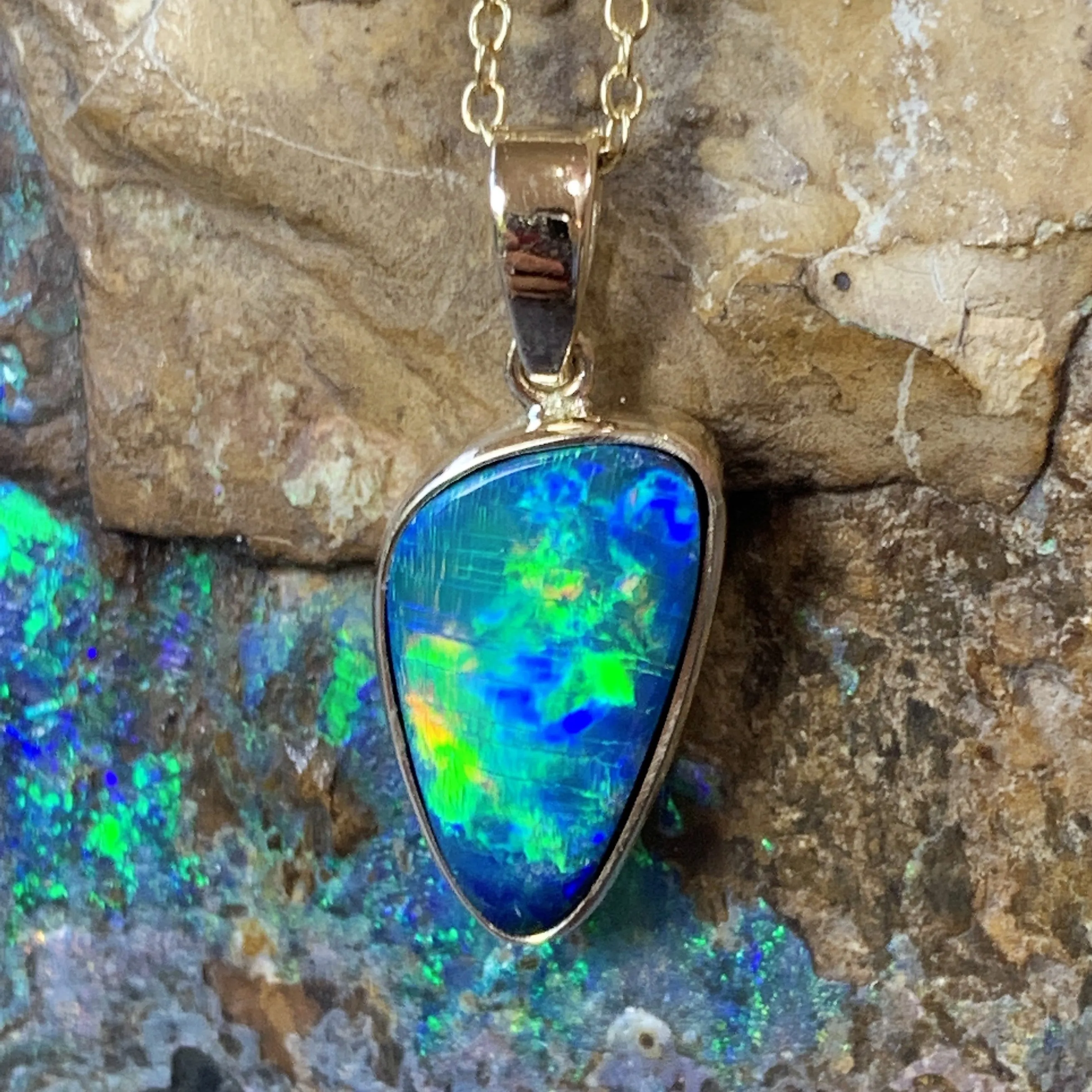 14kt Yellow Gold Black Opal 2.31ct bezel set doublet pendant