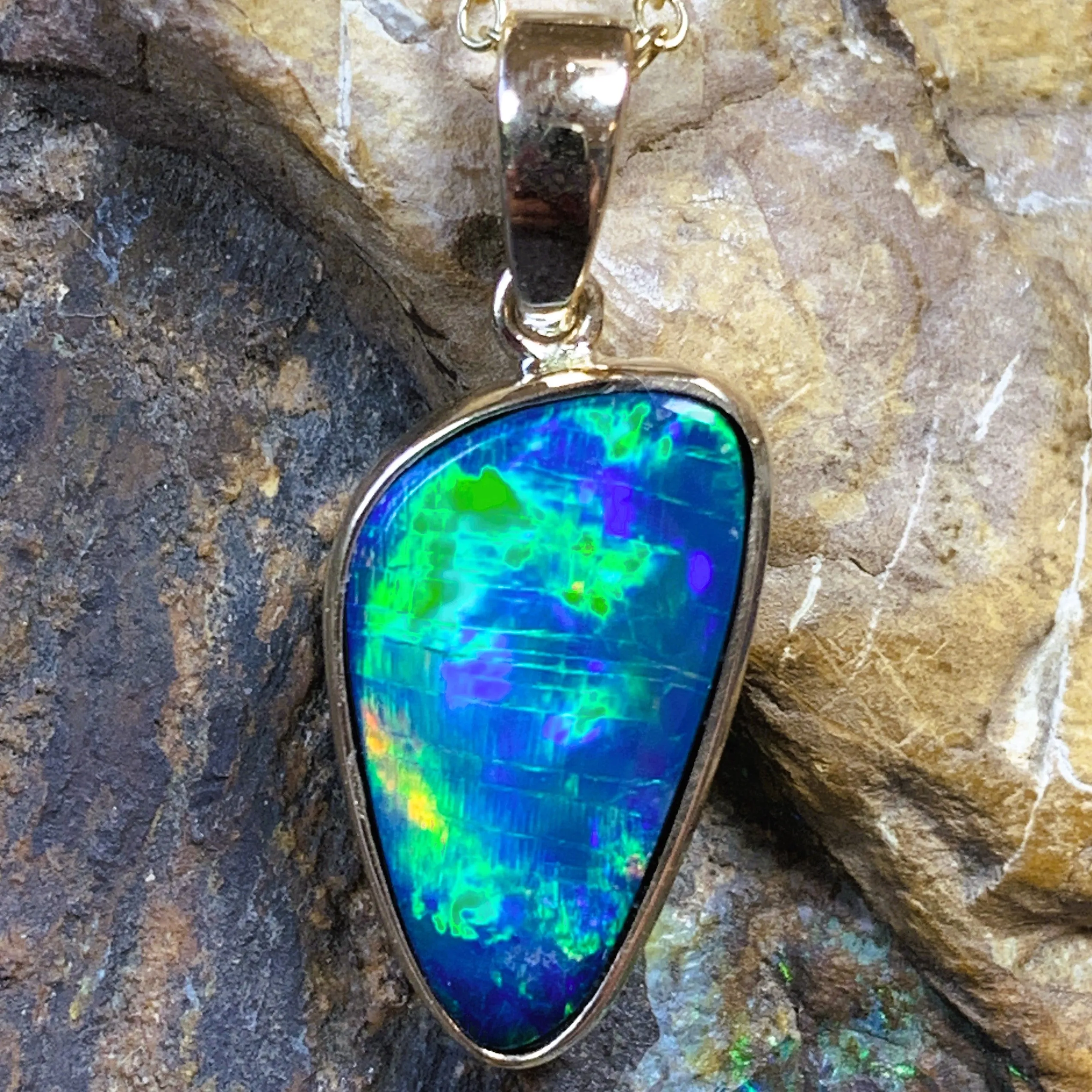 14kt Yellow Gold Black Opal 2.31ct bezel set doublet pendant