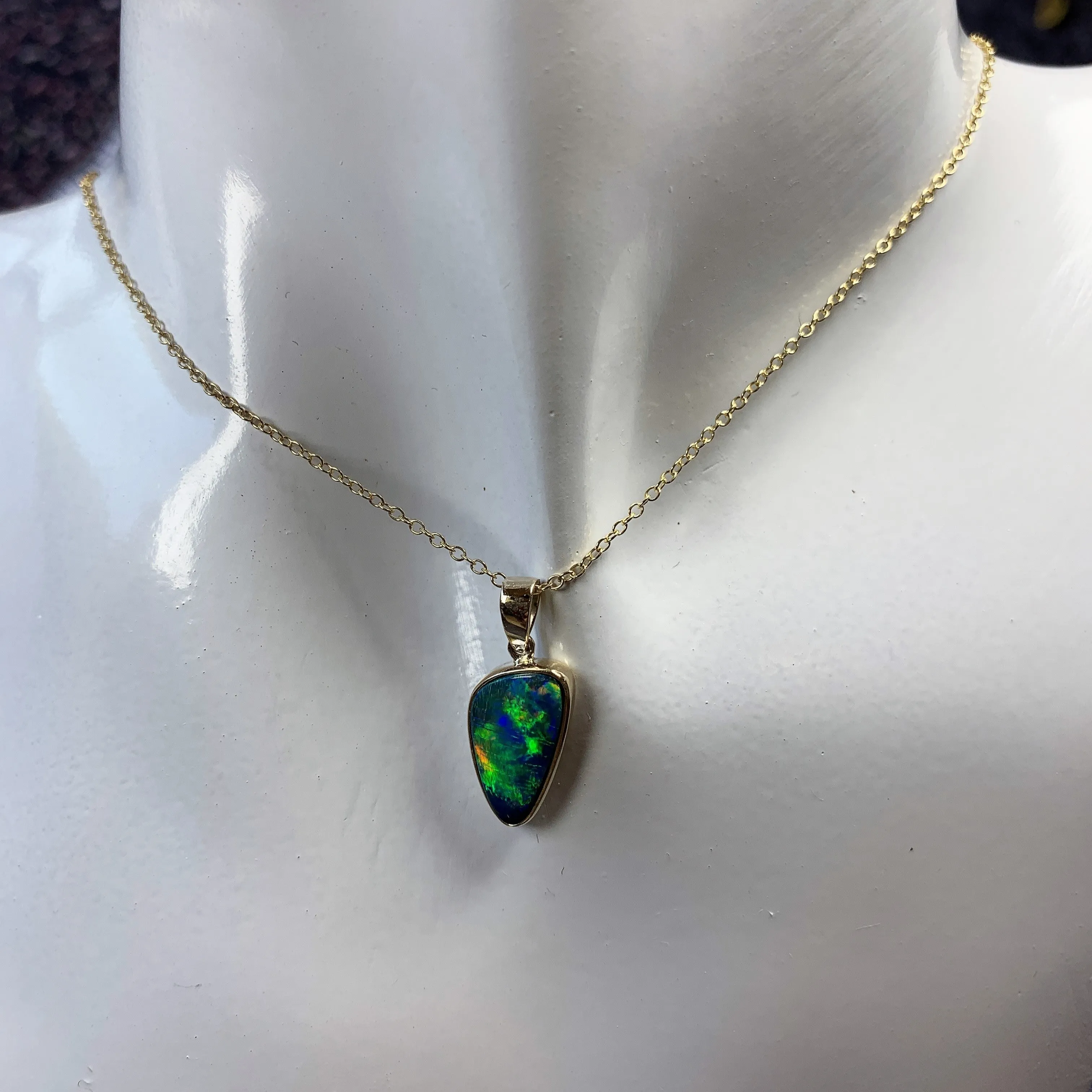 14kt Yellow Gold Black Opal 2.31ct bezel set doublet pendant