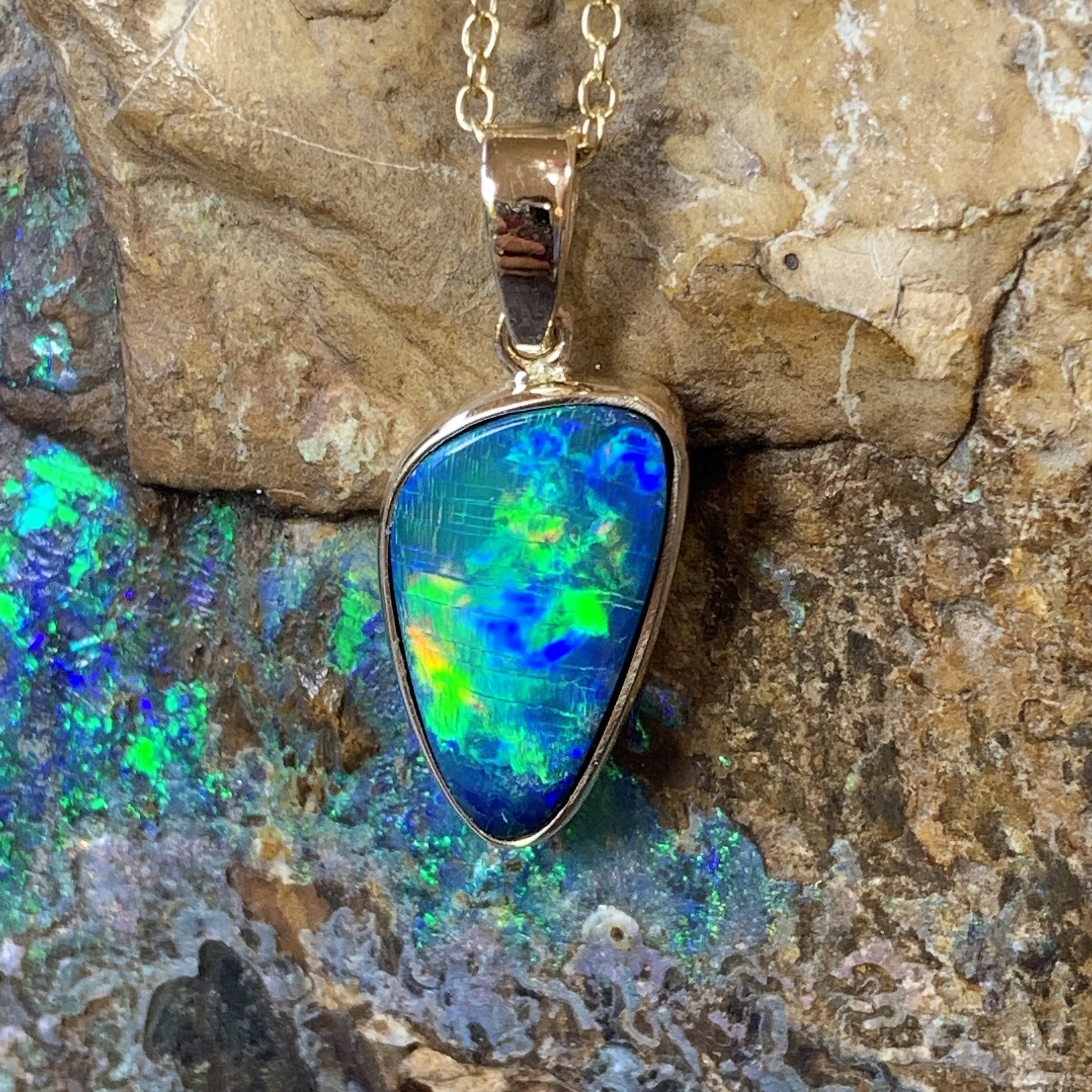 14kt Yellow Gold Black Opal 2.31ct bezel set doublet pendant