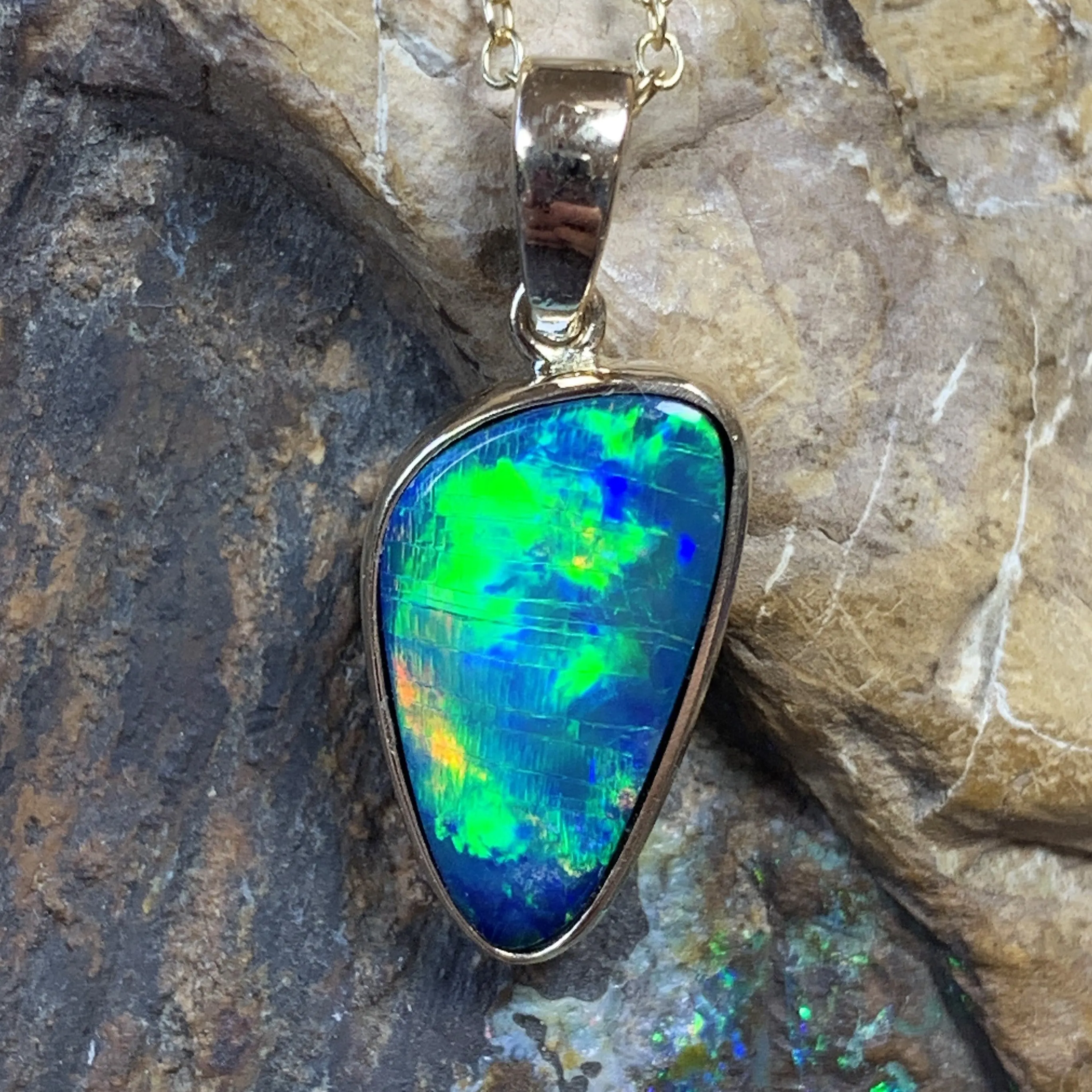 14kt Yellow Gold Black Opal 2.31ct bezel set doublet pendant