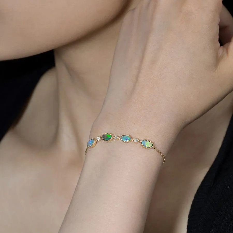 Beautiful Australian Black Opal Diamond Bracelet in 18K Yellow Gold