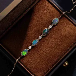 Beautiful Australian Black Opal Diamond Bracelet in 18K Yellow Gold