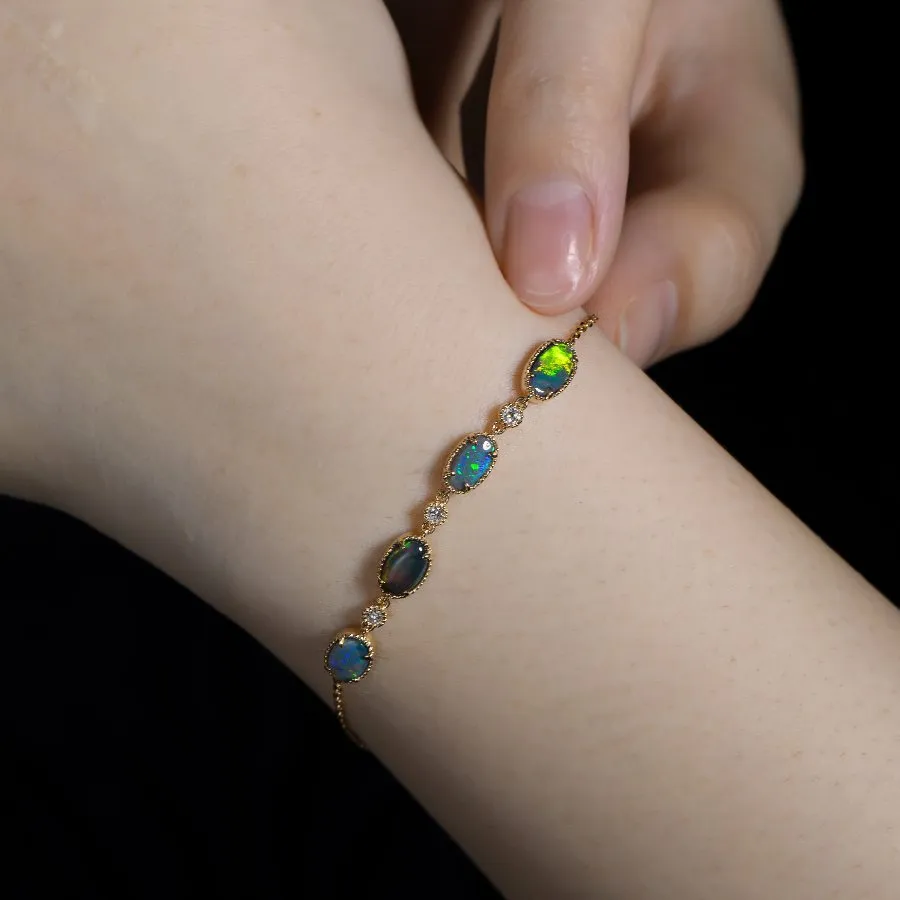 Beautiful Australian Black Opal Diamond Bracelet in 18K Yellow Gold