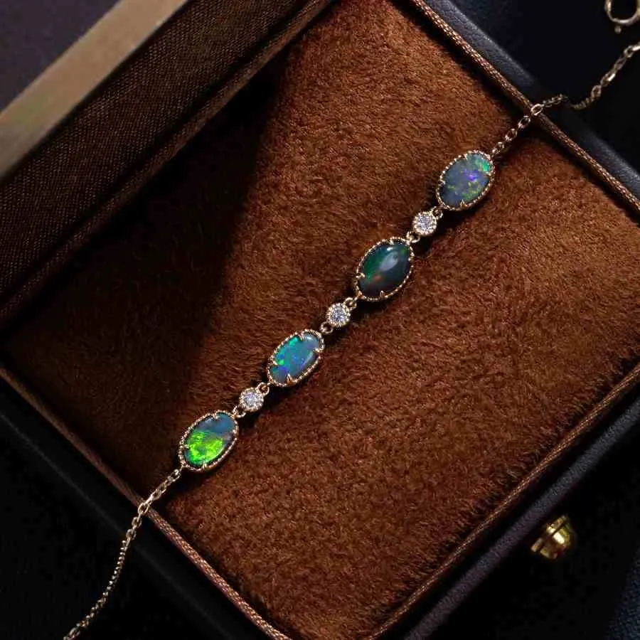 Beautiful Australian Black Opal Diamond Bracelet in 18K Yellow Gold