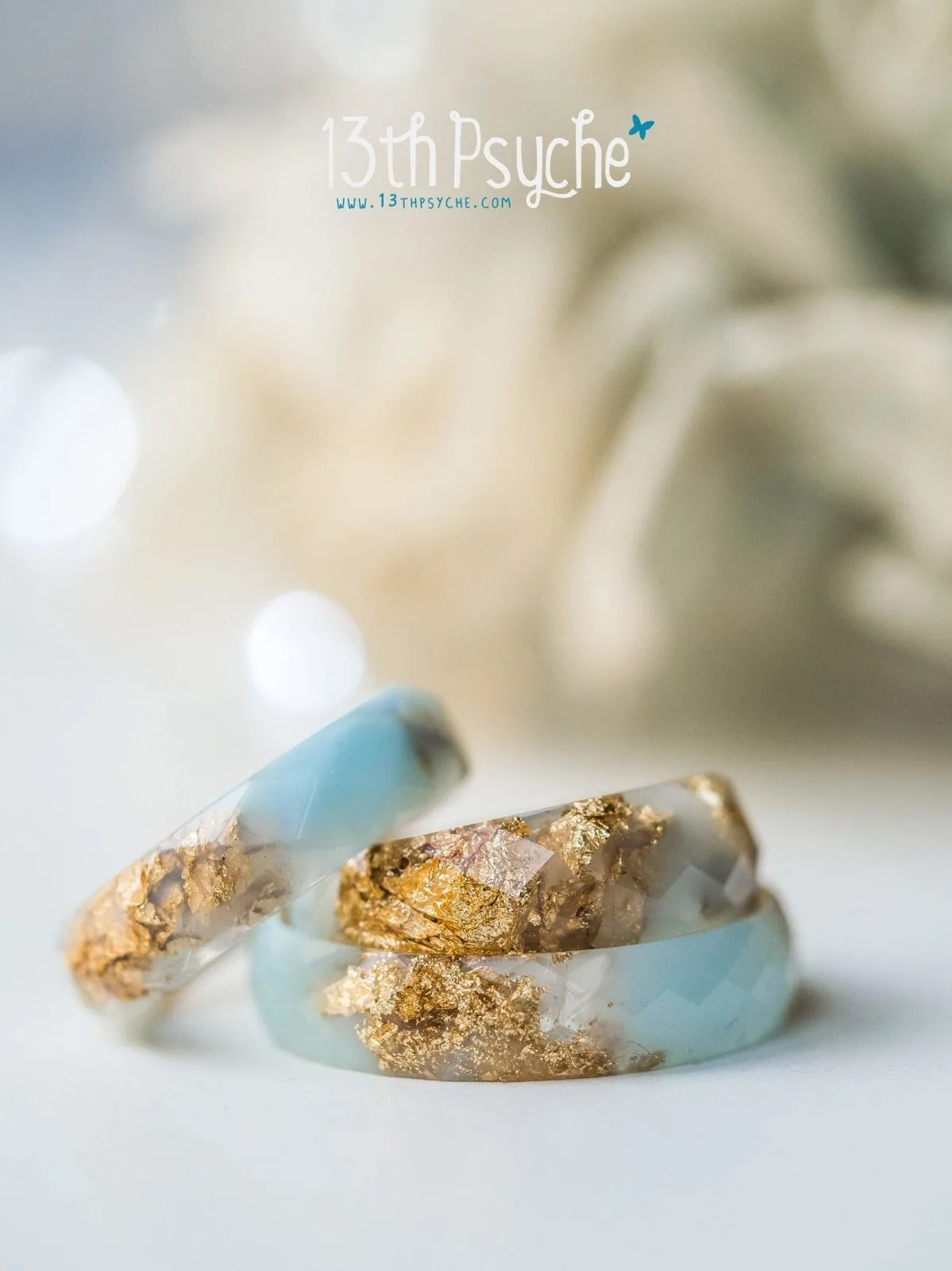 Clear and Pale blue faceted resin ring with gold flakes