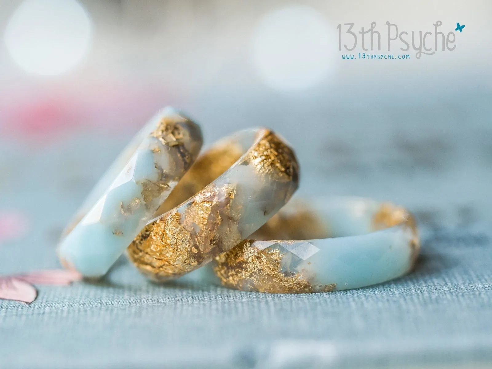 Clear and Pale blue faceted resin ring with gold flakes