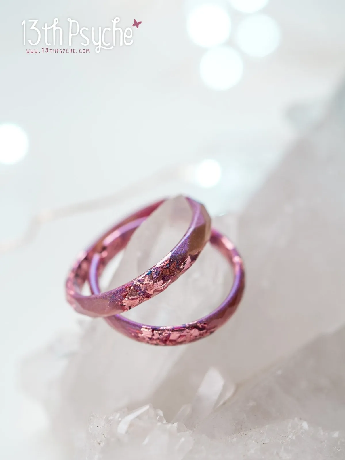 Iridescent pink faceted resin ring with pink metal flakes