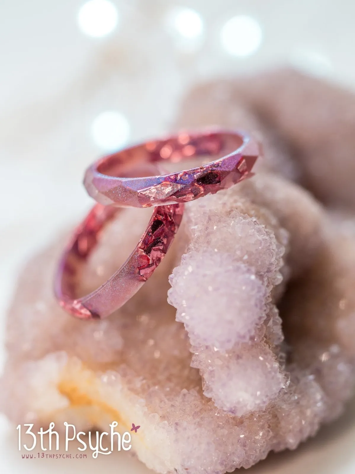 Iridescent pink faceted resin ring with pink metal flakes