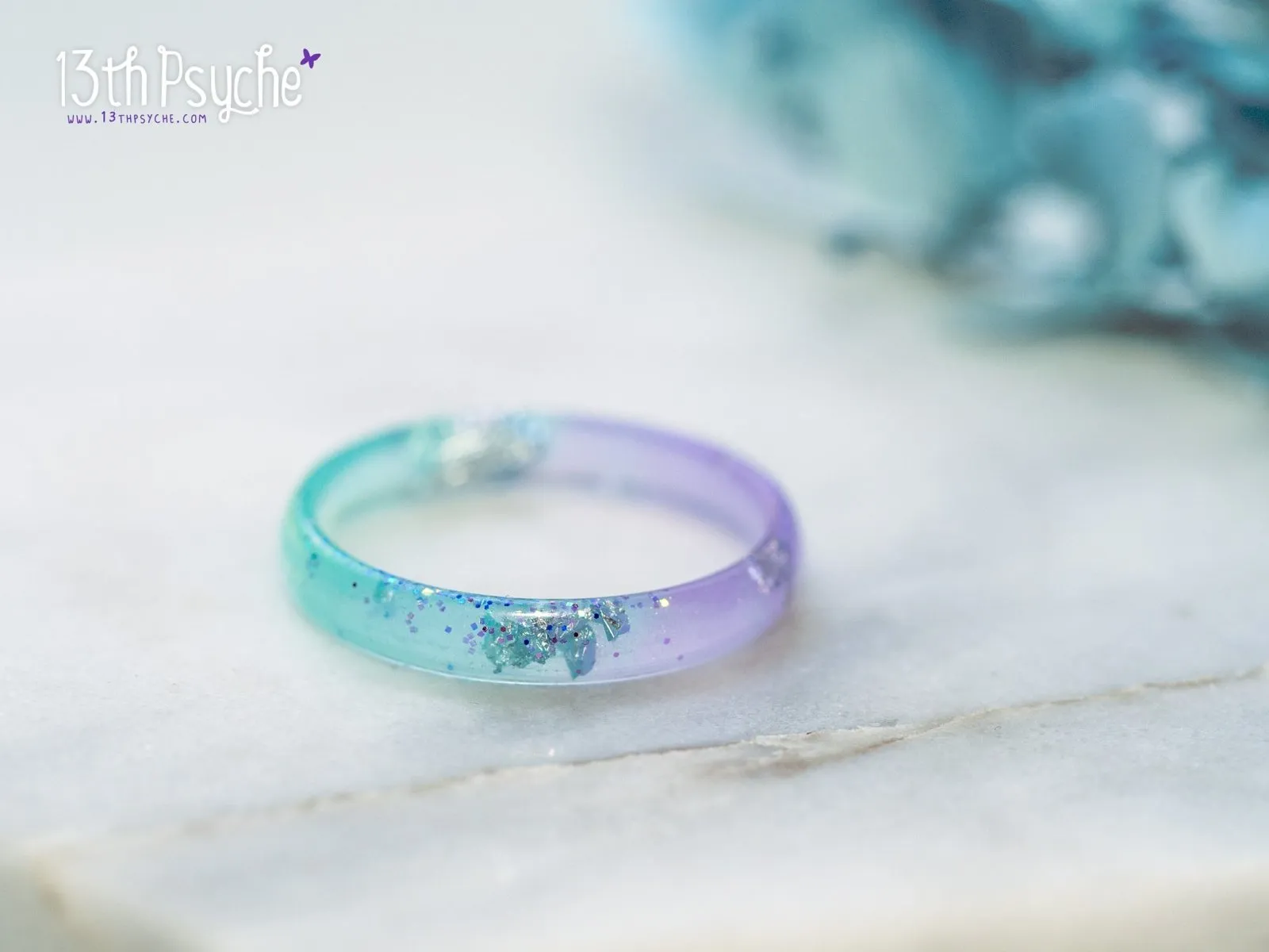 Lilac and turquoise resin ring with silver flakes