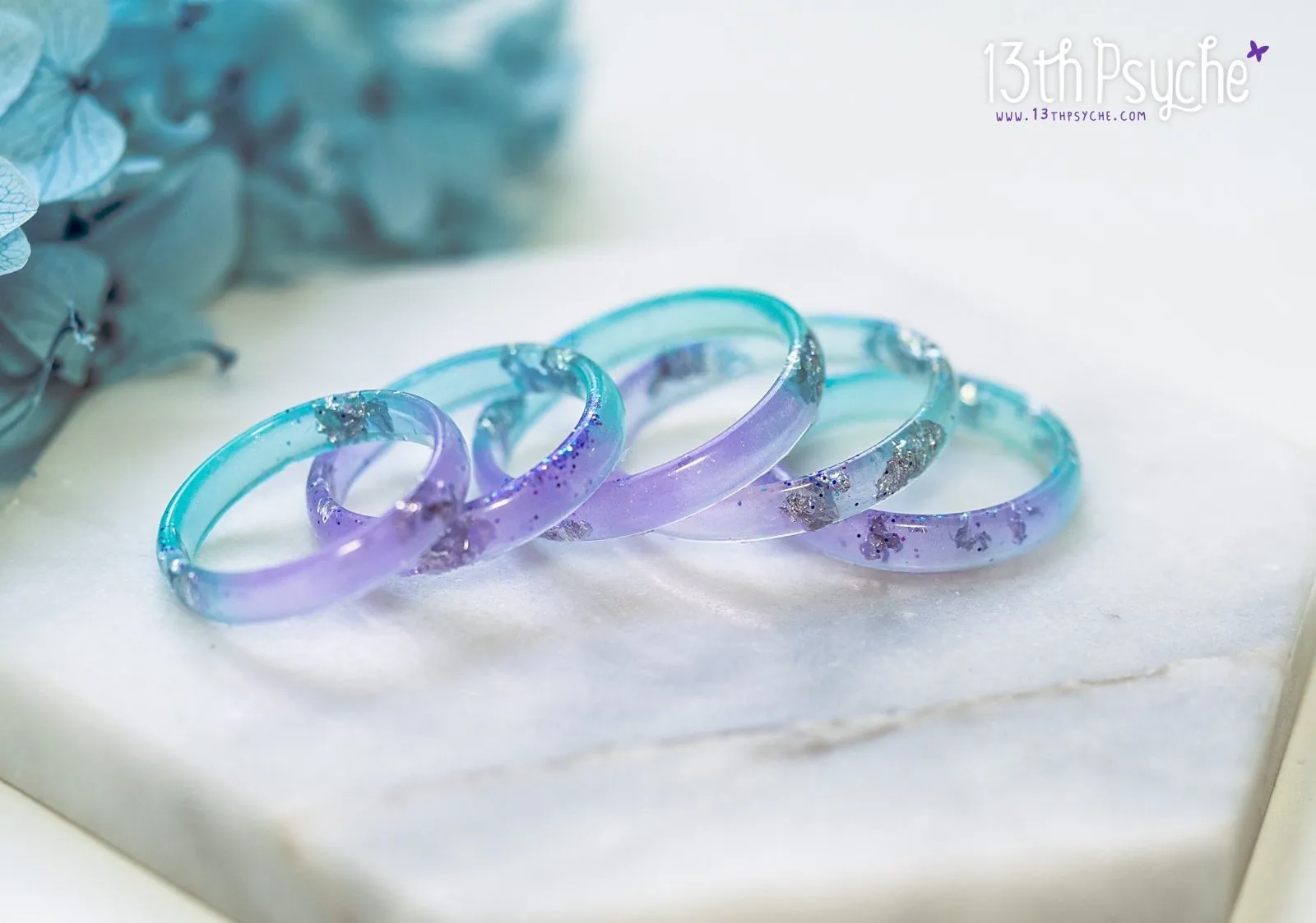 Lilac and turquoise resin ring with silver flakes