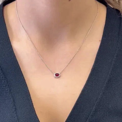 Oval Red Ruby With Diamond Halo Necklace (0.59 ct.) in 18K Gold