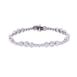 PLATINUM DIAMOND BEZEL SET TENNIS BRACELET - 6.15CTW