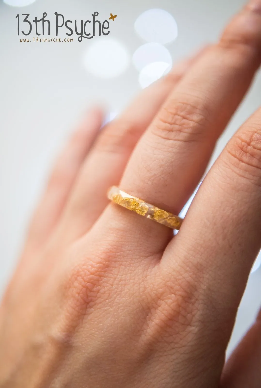 White and gold flakes faceted resin ring